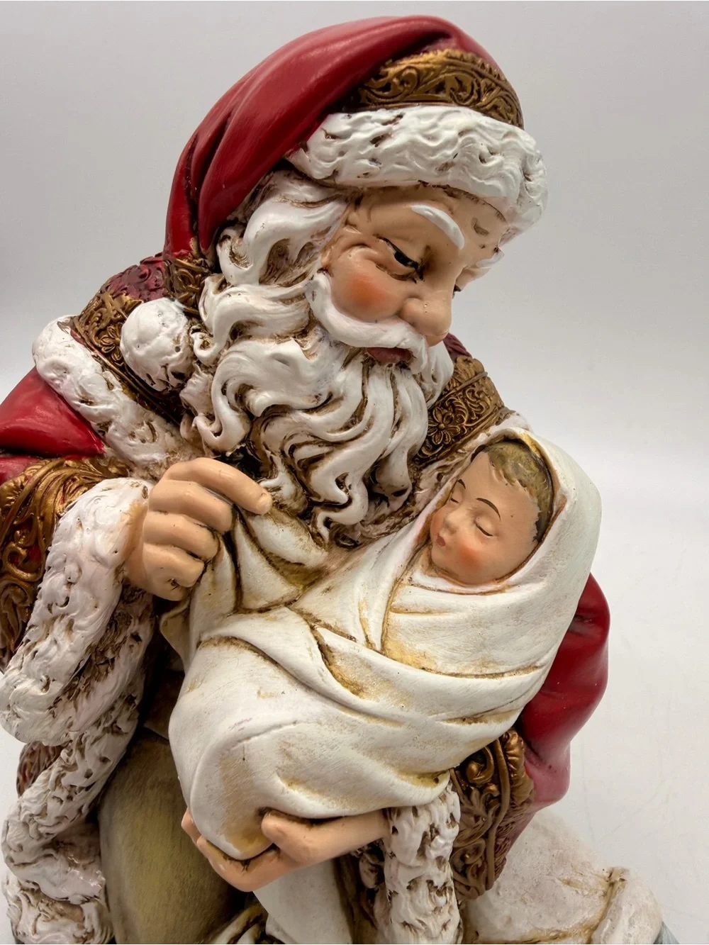 Kneeling Adoring Santa Claus Holding Infant Christ 7